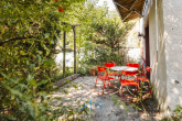 Garten-Terrasse - Idyllisches Einfamilienhaus: Perfekt für Familien mit Garten, Studio und Hobby-Werkstatt oder Garage
